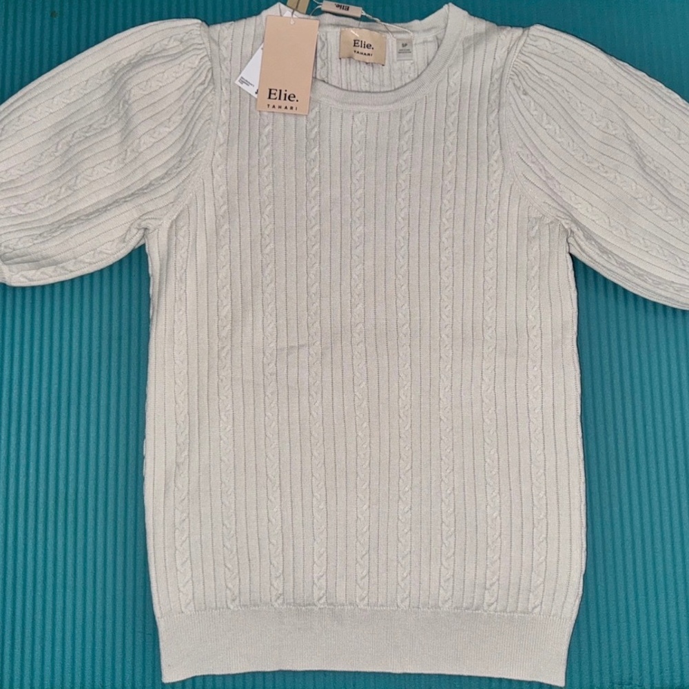 NWT Elie Tahari Knit light beige/silver top.with fluffy sleeves. Size Small